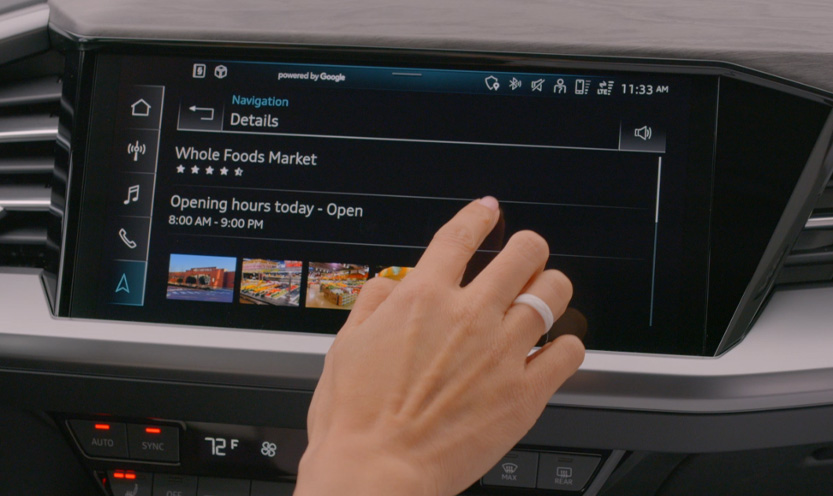 The Audi MMI displaying the Connected POIs feature.